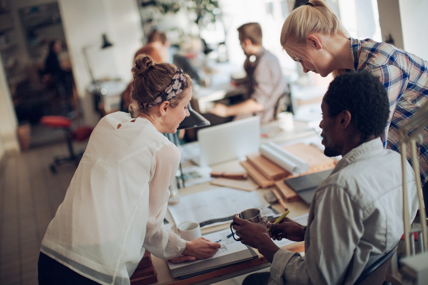 Swedish HR team reviewing work permit application documents for non-EU hire